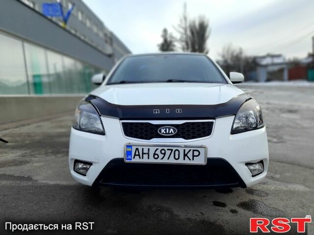 Білий Кіа Ріо, об'ємом двигуна 1.4 л та пробігом 91 тис. км за 5900 $, фото 1 на Automoto.ua