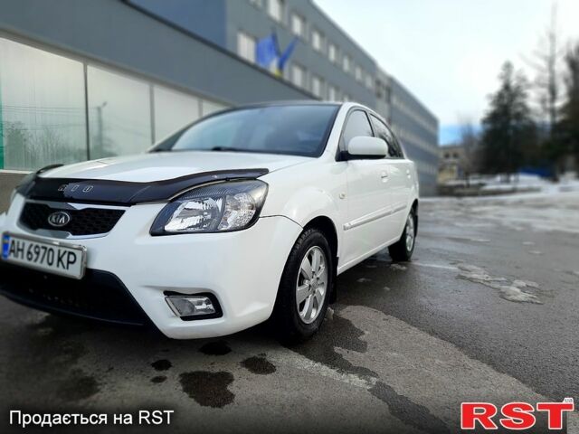 Білий Кіа Ріо, об'ємом двигуна 1.4 л та пробігом 91 тис. км за 5900 $, фото 6 на Automoto.ua