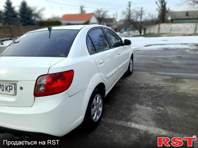 Білий Кіа Ріо, об'ємом двигуна 1.4 л та пробігом 91 тис. км за 5900 $, фото 3 на Automoto.ua