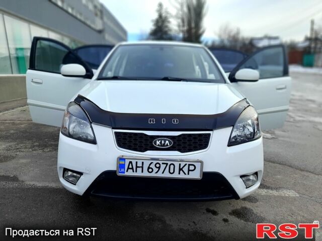 Білий Кіа Ріо, об'ємом двигуна 1.4 л та пробігом 91 тис. км за 5900 $, фото 8 на Automoto.ua