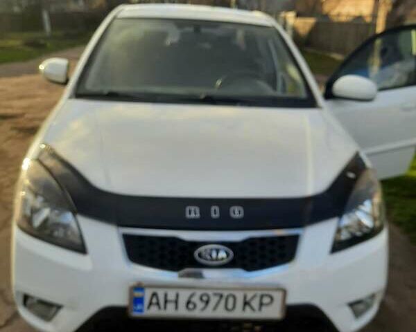 Белый Киа Рио, объемом двигателя 1.4 л и пробегом 91 тыс. км за 6000 $, фото 21 на Automoto.ua