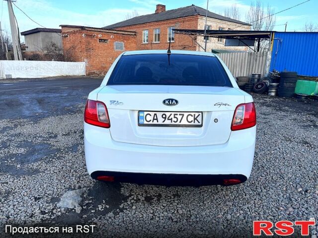 Белый Киа Рио, объемом двигателя 1.4 л и пробегом 220 тыс. км за 6350 $, фото 6 на Automoto.ua