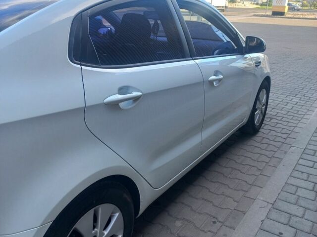 Білий Кіа Ріо, об'ємом двигуна 1.6 л та пробігом 270 тис. км за 6900 $, фото 5 на Automoto.ua