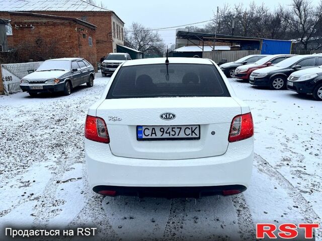 Білий Кіа Ріо, об'ємом двигуна 1.4 л та пробігом 22500 тис. км за 6200 $, фото 3 на Automoto.ua