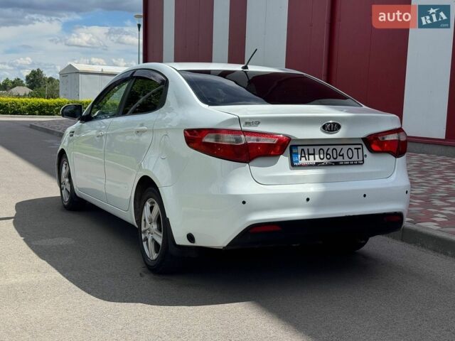 Білий Кіа Ріо, об'ємом двигуна 1.4 л та пробігом 219 тис. км за 5999 $, фото 5 на Automoto.ua