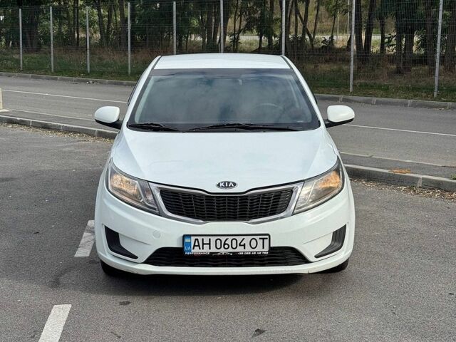 Білий Кіа Ріо, об'ємом двигуна 1.4 л та пробігом 218 тис. км за 5750 $, фото 1 на Automoto.ua