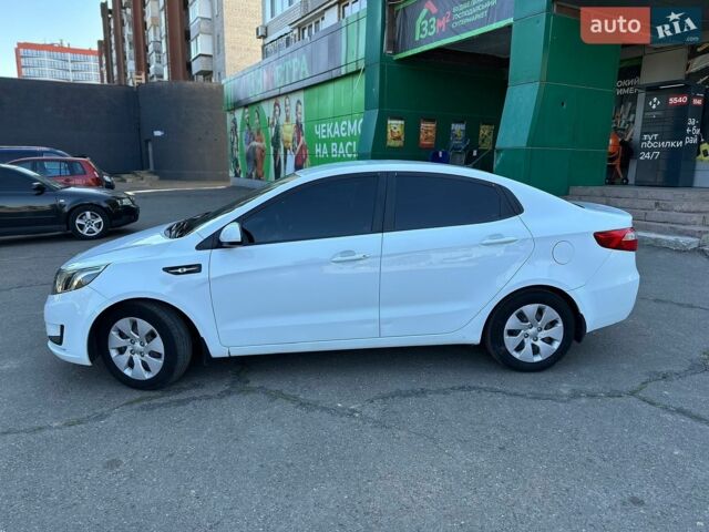 Білий Кіа Ріо, об'ємом двигуна 1.4 л та пробігом 162 тис. км за 6999 $, фото 15 на Automoto.ua