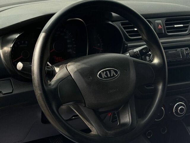 Білий Кіа Ріо, об'ємом двигуна 1.4 л та пробігом 218 тис. км за 5750 $, фото 8 на Automoto.ua