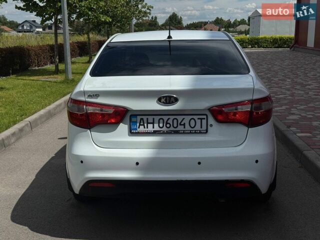 Білий Кіа Ріо, об'ємом двигуна 1.4 л та пробігом 219 тис. км за 5999 $, фото 4 на Automoto.ua