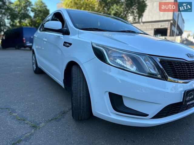 Білий Кіа Ріо, об'ємом двигуна 1.4 л та пробігом 162 тис. км за 6999 $, фото 19 на Automoto.ua