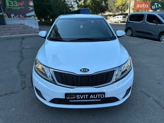 Білий Кіа Ріо, об'ємом двигуна 1.4 л та пробігом 162 тис. км за 6999 $, фото 2 на Automoto.ua