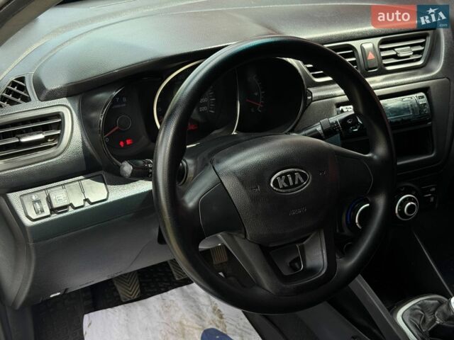 Білий Кіа Ріо, об'ємом двигуна 1.4 л та пробігом 219 тис. км за 5999 $, фото 7 на Automoto.ua
