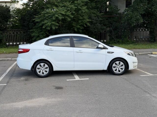 Білий Кіа Ріо, об'ємом двигуна 1.4 л та пробігом 157 тис. км за 6400 $, фото 3 на Automoto.ua