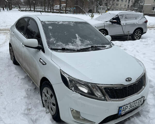 Белый Киа Рио, объемом двигателя 1.4 л и пробегом 136 тыс. км за 7500 $, фото 1 на Automoto.ua