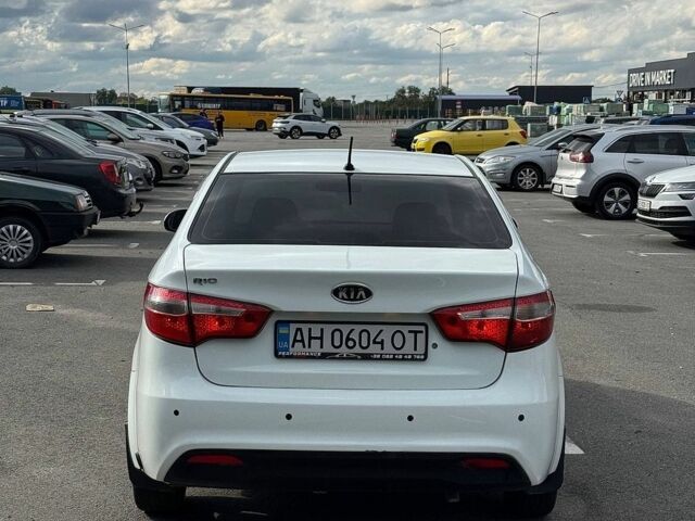 Білий Кіа Ріо, об'ємом двигуна 1.4 л та пробігом 218 тис. км за 5750 $, фото 4 на Automoto.ua