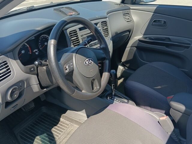 Білий Кіа Ріо, об'ємом двигуна 1.4 л та пробігом 157 тис. км за 4900 $, фото 6 на Automoto.ua