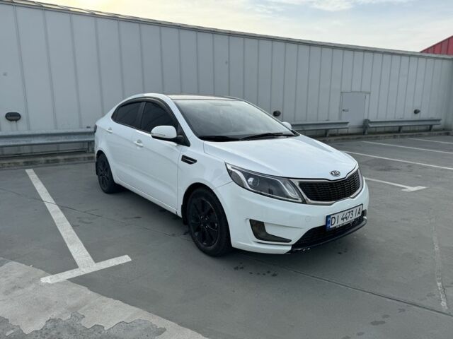 Белый Киа Рио, объемом двигателя 1.6 л и пробегом 257 тыс. км за 6900 $, фото 1 на Automoto.ua