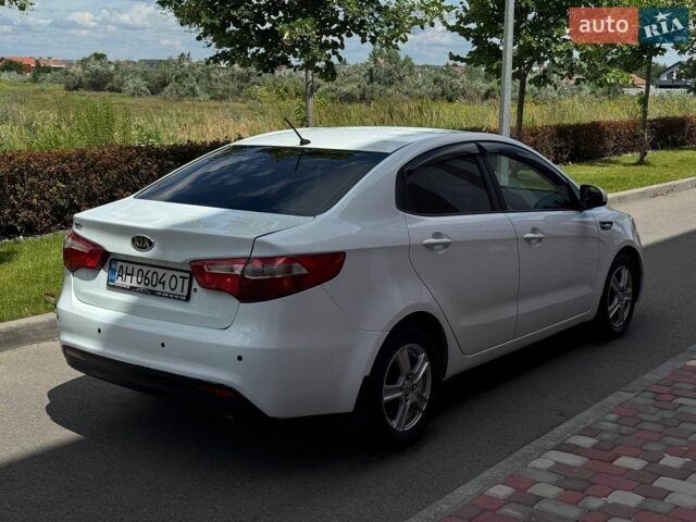Білий Кіа Ріо, об'ємом двигуна 1.4 л та пробігом 219 тис. км за 5999 $, фото 3 на Automoto.ua