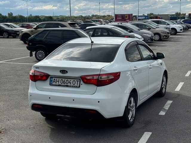Білий Кіа Ріо, об'ємом двигуна 1.4 л та пробігом 218 тис. км за 5750 $, фото 5 на Automoto.ua