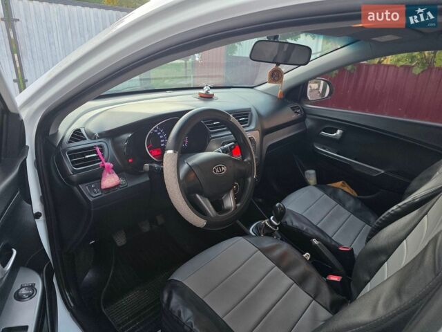 Білий Кіа Ріо, об'ємом двигуна 1.4 л та пробігом 167 тис. км за 6900 $, фото 10 на Automoto.ua