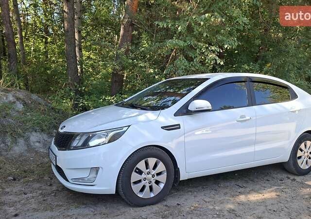 Белый Киа Рио, объемом двигателя 1.59 л и пробегом 210 тыс. км за 6800 $, фото 5 на Automoto.ua