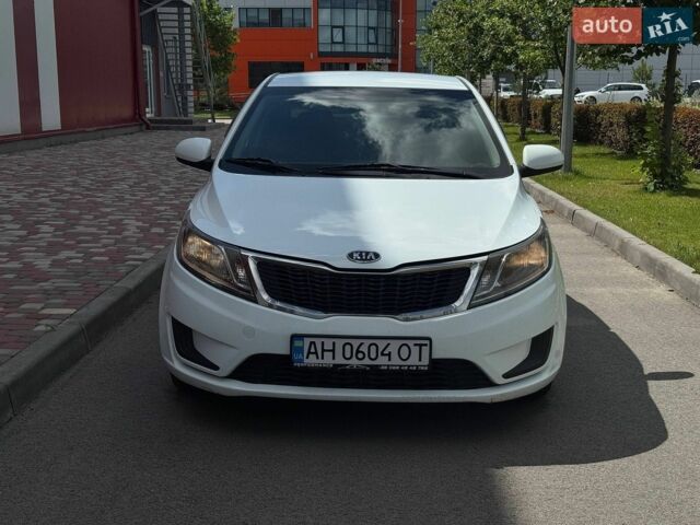 Білий Кіа Ріо, об'ємом двигуна 1.4 л та пробігом 219 тис. км за 5999 $, фото 1 на Automoto.ua