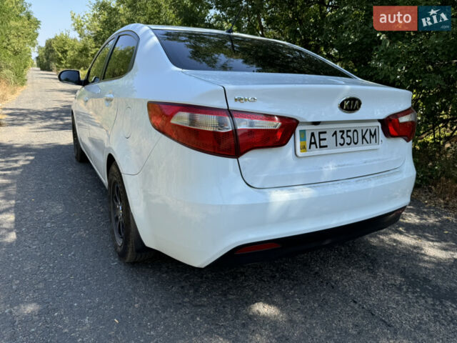 Білий Кіа Ріо, об'ємом двигуна 1.4 л та пробігом 96 тис. км за 8555 $, фото 8 на Automoto.ua