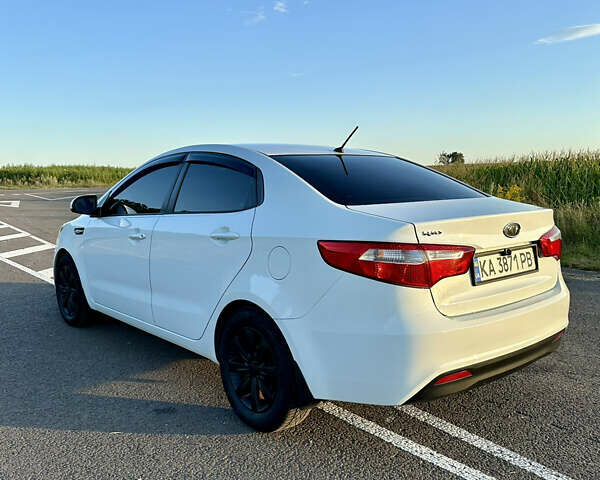 Білий Кіа Ріо, об'ємом двигуна 1.4 л та пробігом 142 тис. км за 6200 $, фото 12 на Automoto.ua