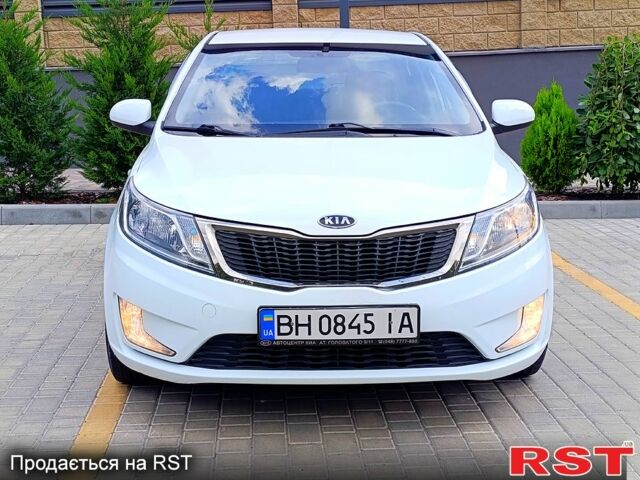Білий Кіа Ріо, об'ємом двигуна 1.4 л та пробігом 99 тис. км за 6500 $, фото 1 на Automoto.ua