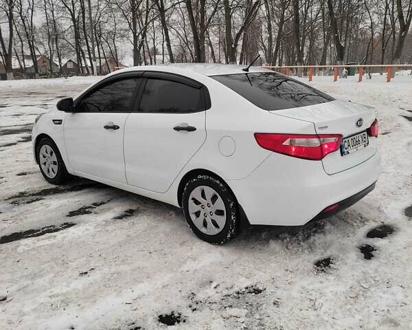 Білий Кіа Ріо, об'ємом двигуна 1.4 л та пробігом 98 тис. км за 8600 $, фото 4 на Automoto.ua