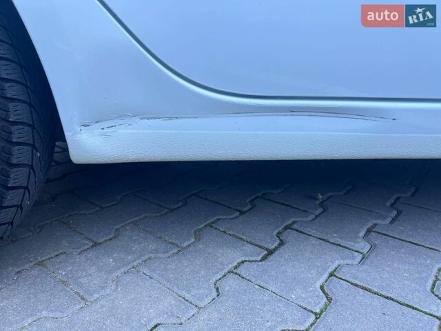 Білий Кіа Ріо, об'ємом двигуна 1.4 л та пробігом 171 тис. км за 6800 $, фото 10 на Automoto.ua