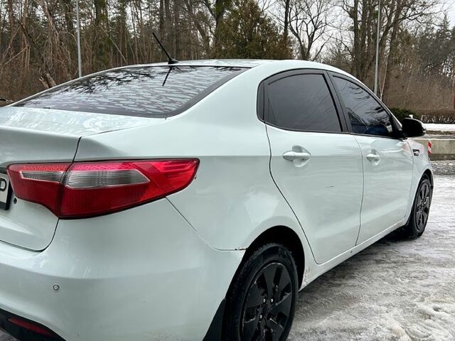 Білий Кіа Ріо, об'ємом двигуна 1.4 л та пробігом 31500 тис. км за 5300 $, фото 5 на Automoto.ua