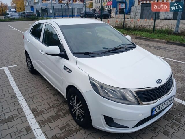 Білий Кіа Ріо, об'ємом двигуна 1.4 л та пробігом 230 тис. км за 5300 $, фото 5 на Automoto.ua