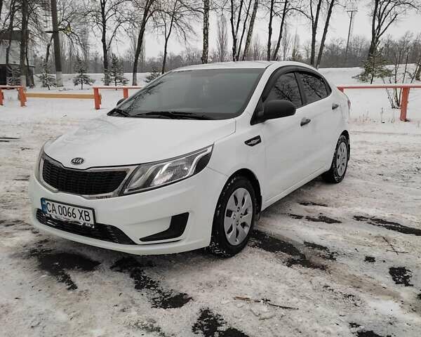 Білий Кіа Ріо, об'ємом двигуна 1.4 л та пробігом 98 тис. км за 8600 $, фото 3 на Automoto.ua