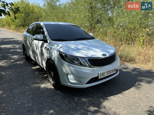 Білий Кіа Ріо, об'ємом двигуна 1.4 л та пробігом 96 тис. км за 8555 $, фото 2 на Automoto.ua
