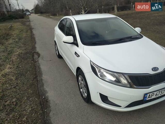 Білий Кіа Ріо, об'ємом двигуна 1.4 л та пробігом 157 тис. км за 6700 $, фото 2 на Automoto.ua