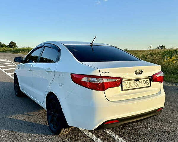 Білий Кіа Ріо, об'ємом двигуна 1.4 л та пробігом 142 тис. км за 6200 $, фото 13 на Automoto.ua