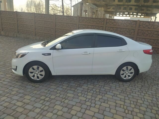 Білий Кіа Ріо, об'ємом двигуна 1.4 л та пробігом 158 тис. км за 6500 $, фото 16 на Automoto.ua