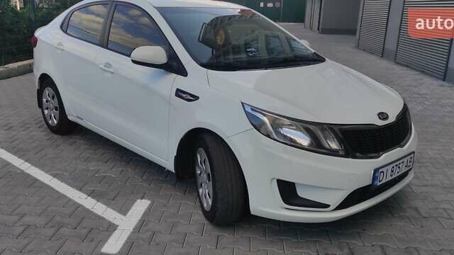 Белый Киа Рио, объемом двигателя 1.4 л и пробегом 168 тыс. км за 6800 $, фото 2 на Automoto.ua