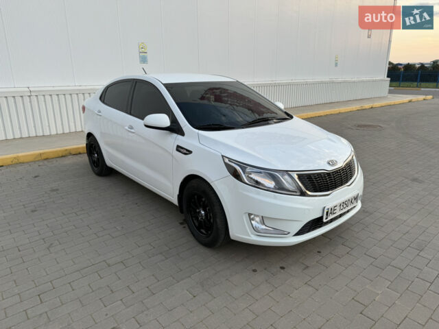 Білий Кіа Ріо, об'ємом двигуна 1.4 л та пробігом 96 тис. км за 8555 $, фото 26 на Automoto.ua