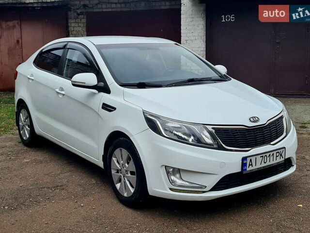 Белый Киа Рио, объемом двигателя 1.59 л и пробегом 159 тыс. км за 8800 $, фото 1 на Automoto.ua