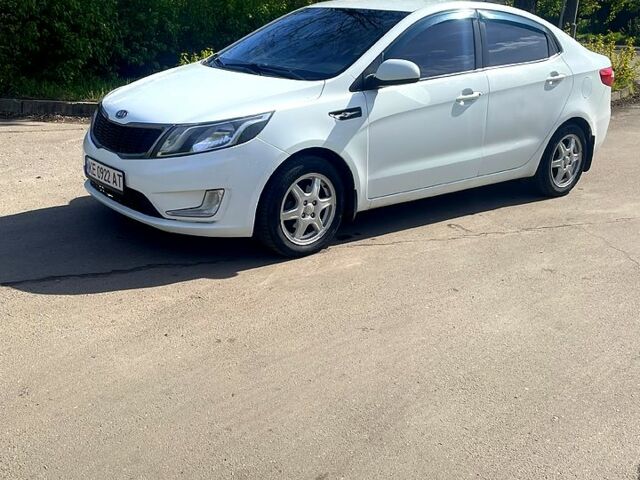 Білий Кіа Ріо, об'ємом двигуна 1.4 л та пробігом 249 тис. км за 6000 $, фото 2 на Automoto.ua
