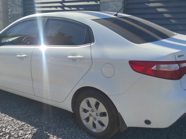 Белый Киа Рио, объемом двигателя 1.4 л и пробегом 170 тыс. км за 6700 $, фото 1 на Automoto.ua