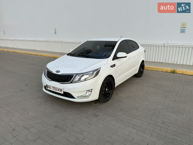 Білий Кіа Ріо, об'ємом двигуна 1.4 л та пробігом 96 тис. км за 8555 $, фото 25 на Automoto.ua
