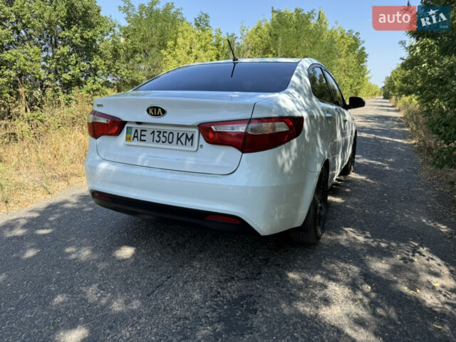 Білий Кіа Ріо, об'ємом двигуна 1.4 л та пробігом 96 тис. км за 8555 $, фото 6 на Automoto.ua