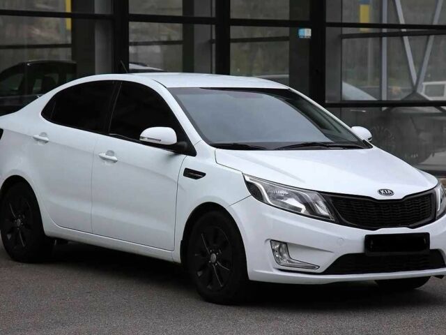 Белый Киа Рио, объемом двигателя 1.6 л и пробегом 125 тыс. км за 7900 $, фото 1 на Automoto.ua