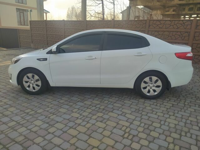 Білий Кіа Ріо, об'ємом двигуна 1.4 л та пробігом 158 тис. км за 6500 $, фото 11 на Automoto.ua