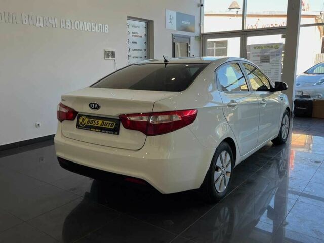 Білий Кіа Ріо, об'ємом двигуна 1.6 л та пробігом 182 тис. км за 7330 $, фото 6 на Automoto.ua