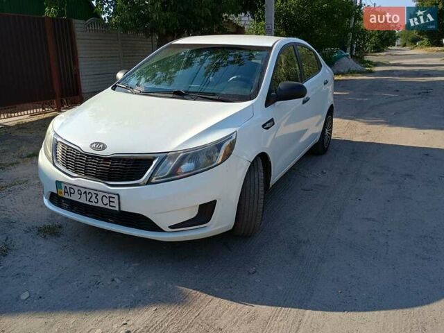 Белый Киа Рио, объемом двигателя 1.4 л и пробегом 224 тыс. км за 7200 $, фото 1 на Automoto.ua