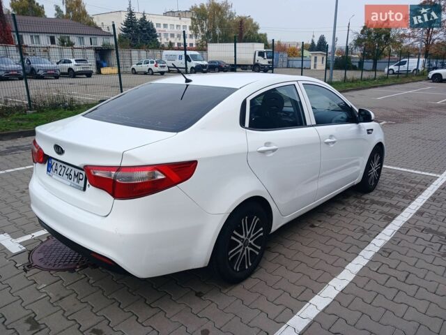 Білий Кіа Ріо, об'ємом двигуна 1.4 л та пробігом 230 тис. км за 5300 $, фото 9 на Automoto.ua